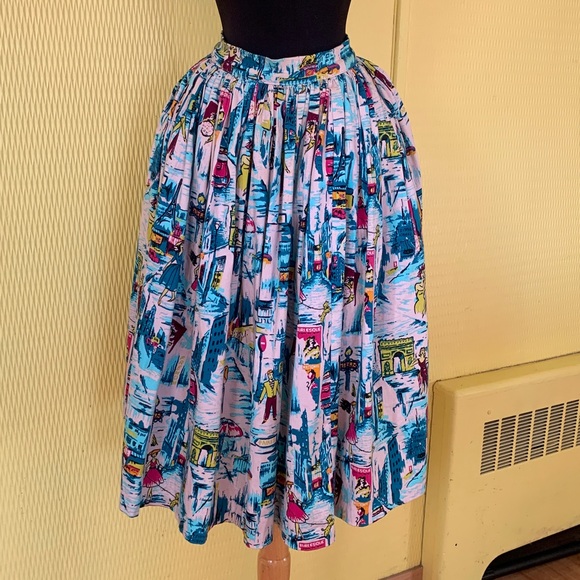 Pinup Couture Dresses & Skirts - Pinup couture Jenny skirt with Paris print and POCKETS!
Size medium waist 30”